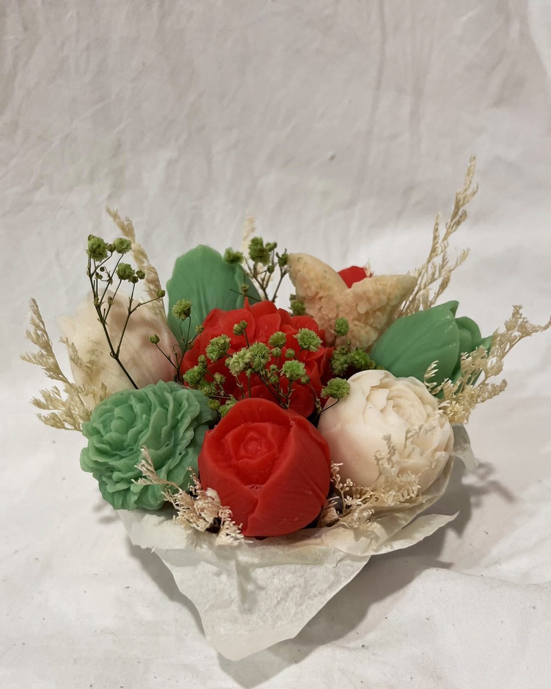 Petal Paradise soap flower arrangement in red, green and white